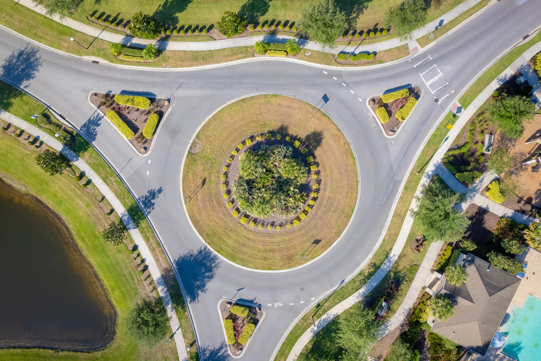 FAA certified aerial drone photography of Central Florida neighborhood roundabout and community by REMIX Real Estate Media 9 Orlando